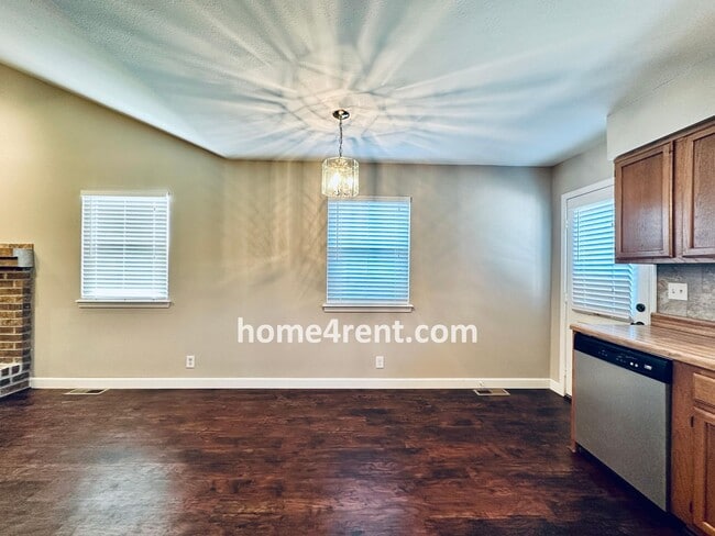 Building Photo - Updated Kitchen, Composite Deck and Refrig...