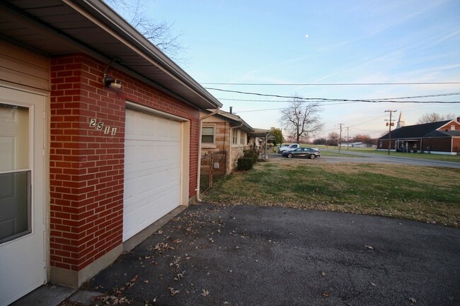 Building Photo - Adorable 3-brm brick ranch with lots of natural light, family room/den, attached garage