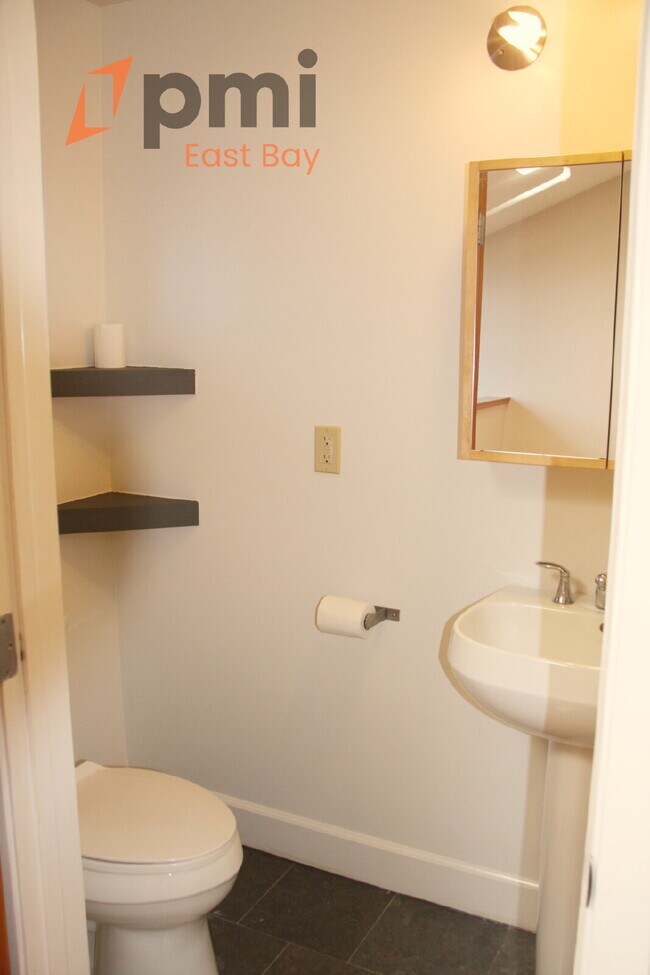 Building Photo - Bright Industrial-Style Loft in a Converte...