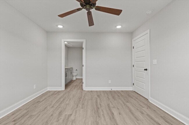 Building Photo - "Brand-New Townhome Awaits!"