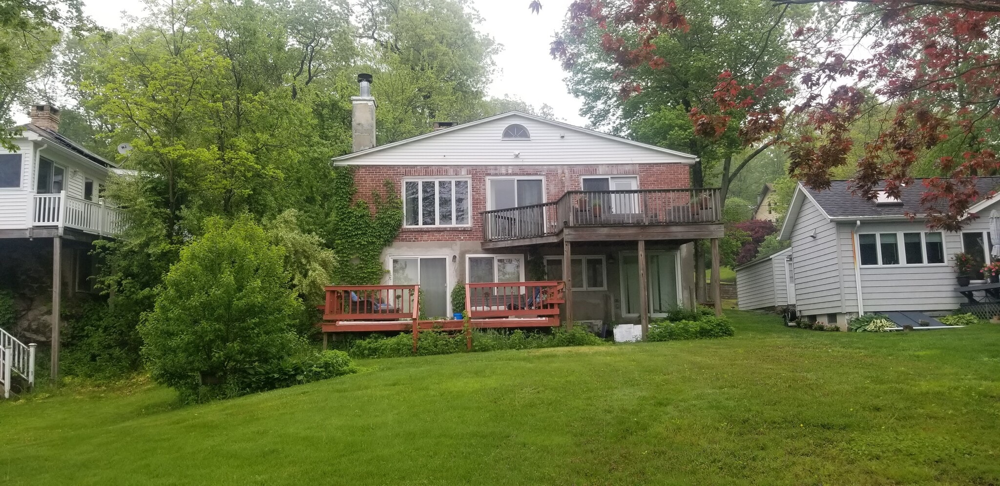 Standing with lake behind you view of home - 220 Shore Dr