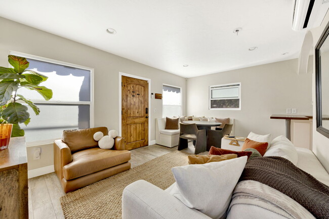 front door, breakfast nook, shot from bedroom door - 319 W Chevy Chase Dr