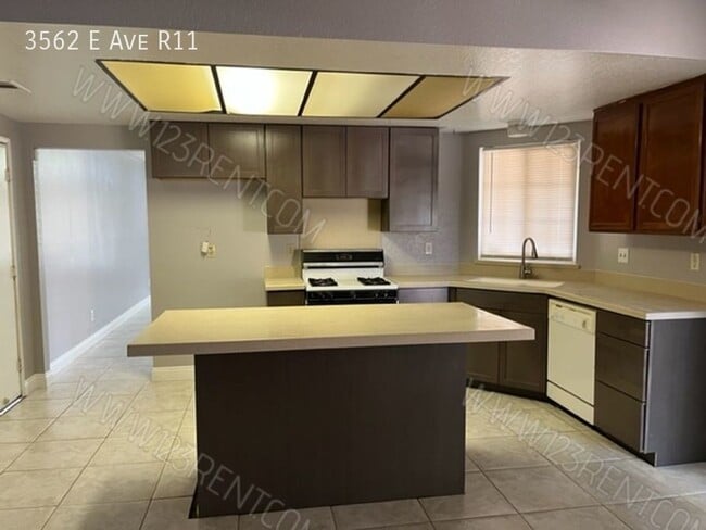 Building Photo - 3562 E Ave R-11