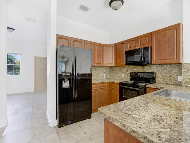 Building Photo - 18190 NW 59th Ave