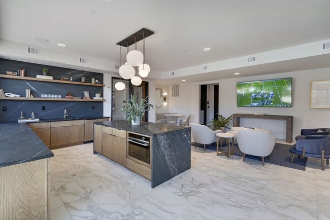 Building Photo - Experience a new standard of elevated city...