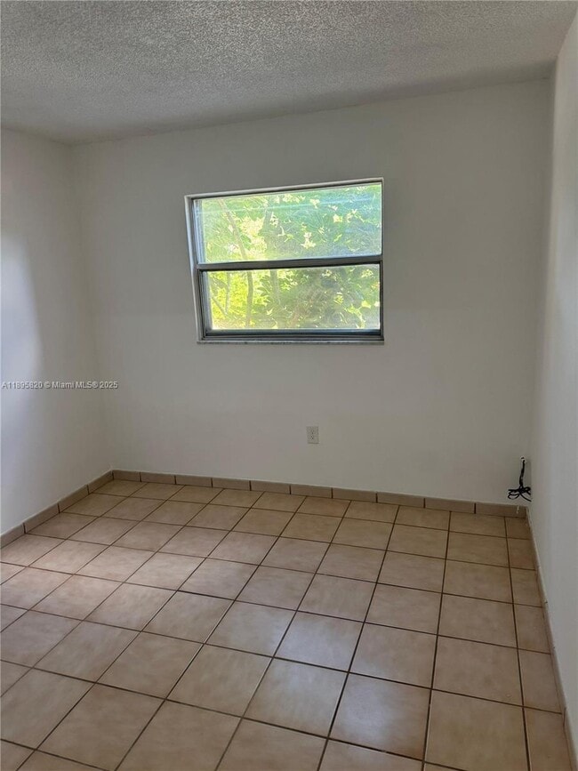Building Photo - 4265 NW S Tamiami Canal Dr