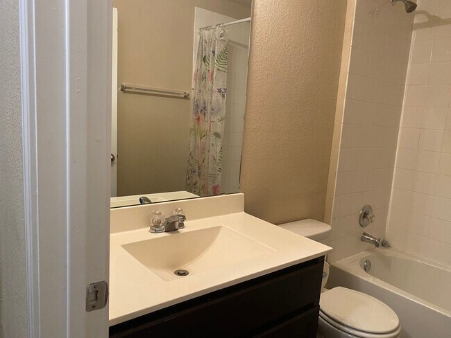 Building Photo - Three Bedroom, Two Bath, Two Car Garage, Washer and Dryer are included.