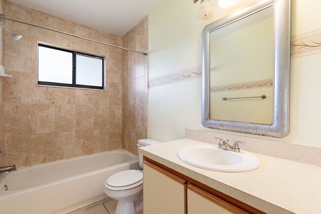 Building Photo - SUPER LOCATION FOR THIS 3/2 w 2 car garage home!!