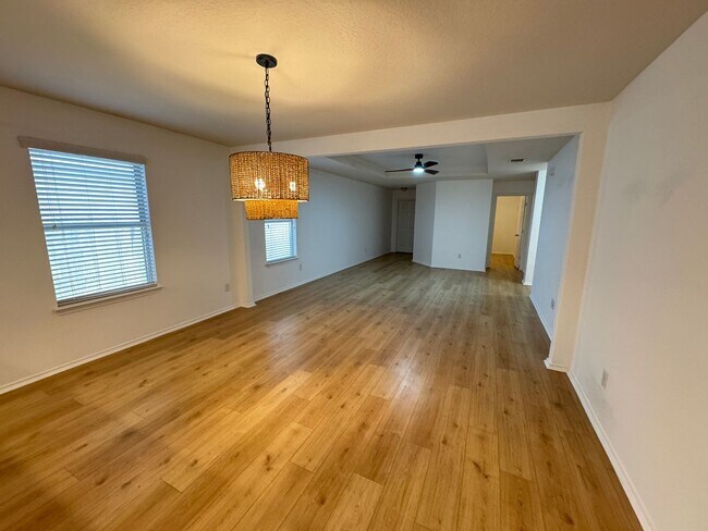 Building Photo - CUTE ONE STORY FEATURING WOOD STYLE VINYL ...