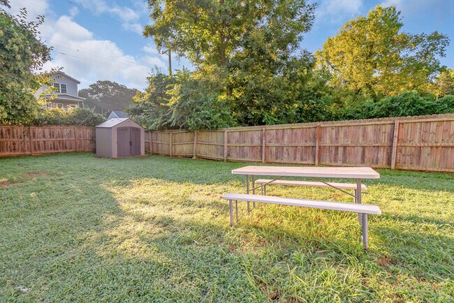 Building Photo - LIVE CLOSE TO THE ACTION — Modern 3-Bedroom Rental in Charlotte’s Reid Park!