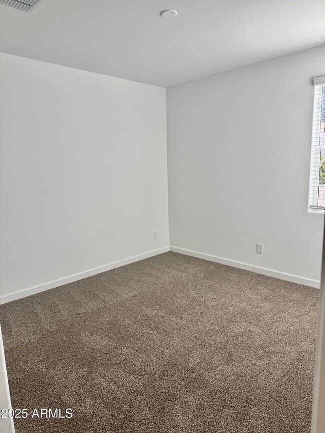 Building Photo - 5835 E Freesia Ln