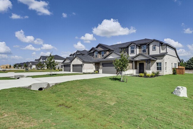 Building Photo - AVAILABLE NOW! NEW LUXURIOUS TRIPLEX LOCATED ON 1-ACRE LOT IN MIDLOTHIAN, TX!