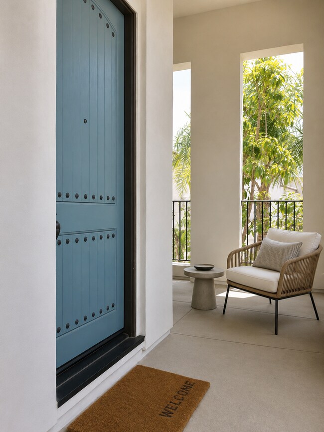 Building Photo - Beautifully Remodel Townhouse with AC & Two Car Garage!