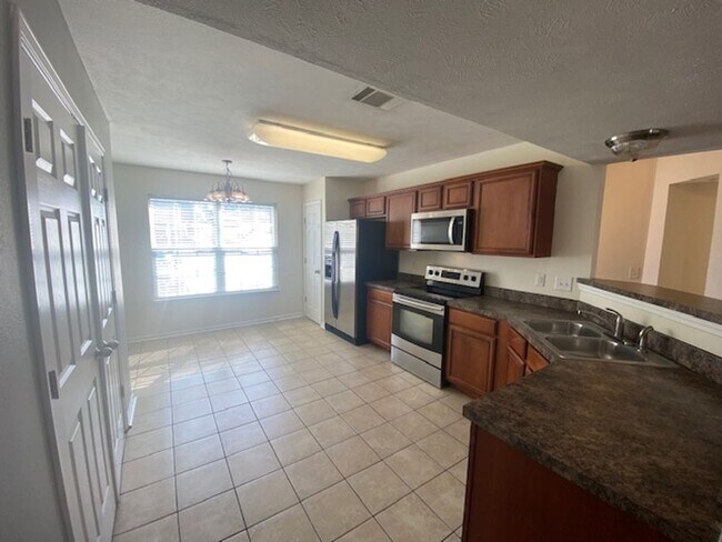 Building Photo - End Unit Townhouse Now Available at Barnes...