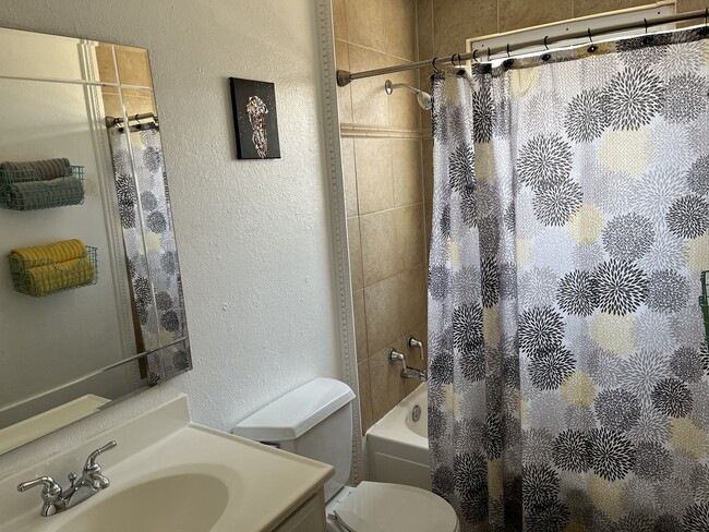 Upstairs bathroom has a tub along with shower - 14532 E Radcliff Dr