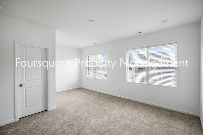 Building Photo - Spacious 3-Bed / 2.5-Bath Townhome with First-Floor Den, Hardwood Floors & 1-Car Garage – Wendell...