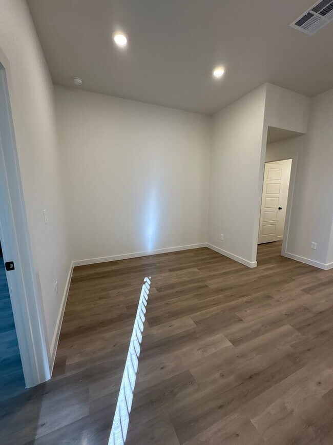 Building Photo - Pay NO RENT until March!! New, with great sunset views; 2168 Langfords' the home for you!