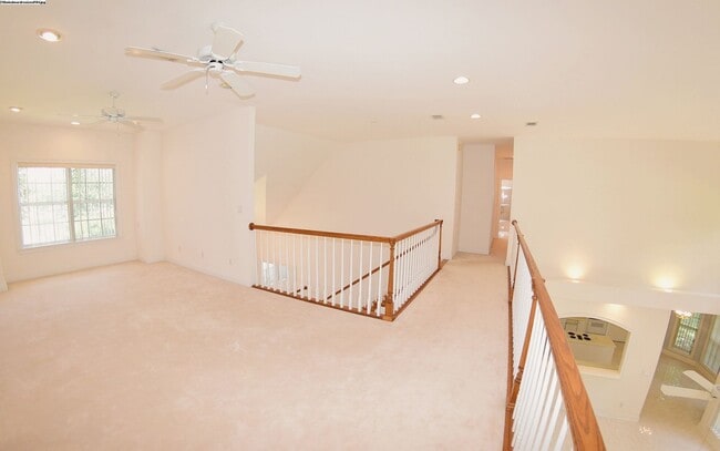 Building Photo - Executive Lakeview Home in Gated Windward Community!