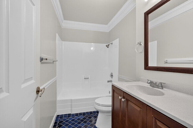 Building Photo - Beautifully Updated 2BR Condo with New Appliances & Community Pool