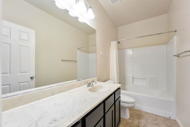 Building Photo - Stylish Two-Story Retreat with Designer Kitchen, Private Backyard & Flexible Living Space!