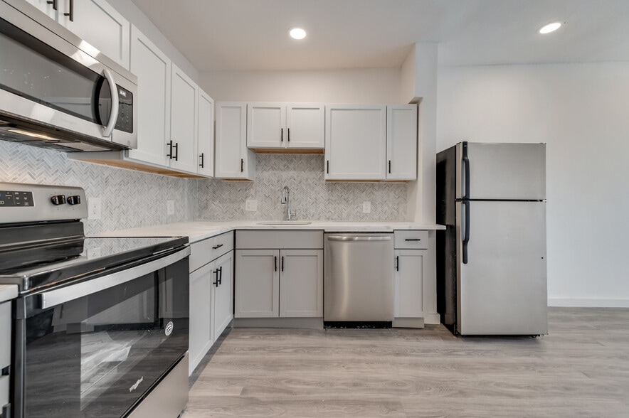 New Cabinets, New Appliances, New Backsplash, New Countertops - 4330 Bowser Ave