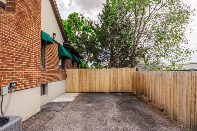 Building Photo - Charming 1935 Tudor in 15th & 15th – Renovated with Modern Luxury