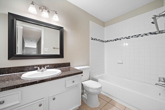 Building Photo - Lovely 3 Bedroom 2 Bath Duplex Home with Totally Private Backyard with Nice Wooden Privacy Fence!!