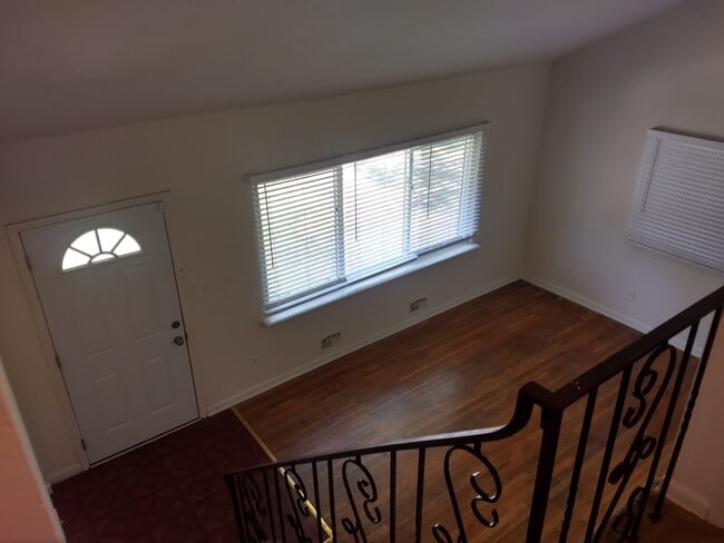 Building Photo - TRI-LEVEL HOME WITH GARAGE AND LARGE FENCE...