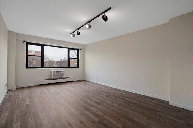 Building Photo - 83-60 118th St