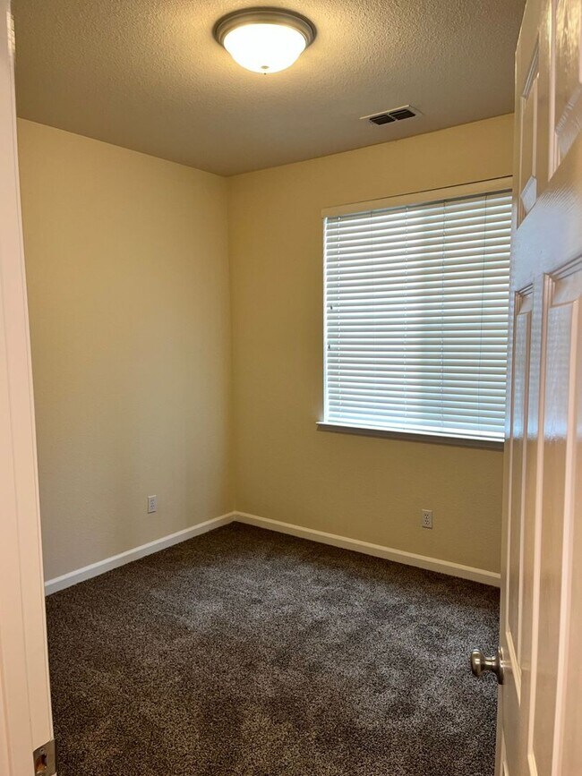 Building Photo - COMING SOON! Charming 4-bedroom, 2.5-bathroom home