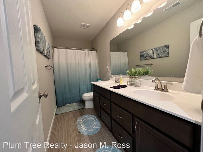 Building Photo - 4 br, 2.5 bath House - 7876 Ellington Court