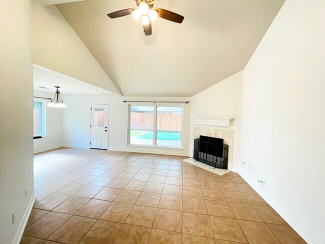 Open living area with high ceilings - 14511 Enola Dr