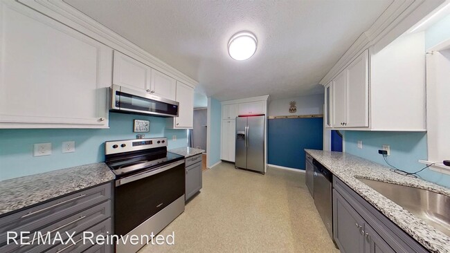 Building Photo - 3 br, 1.5 bath House - 1009 Seymour Dr.