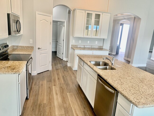 Building Photo - "Spacious 4-Bedroom 3-Bath with In-Law Suite & Granite Finishes in Palm Bay!"