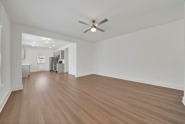 Building Photo - One Level Home with Garage and Fenced Back...