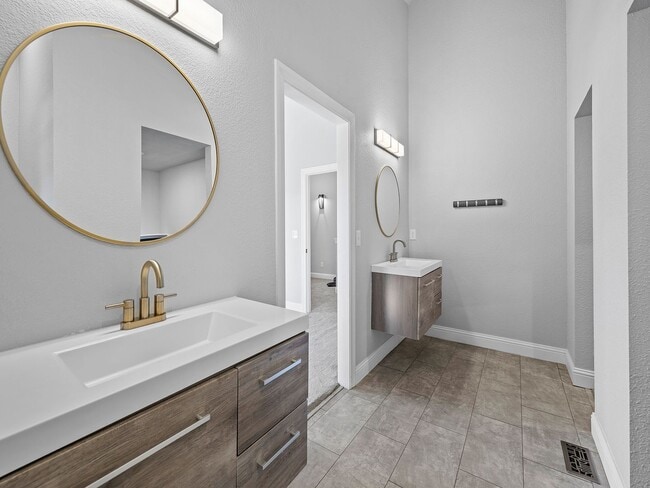 Building Photo - 4-Bedroom Townhome with Finished Basement, Garage & Private Outdoor Space