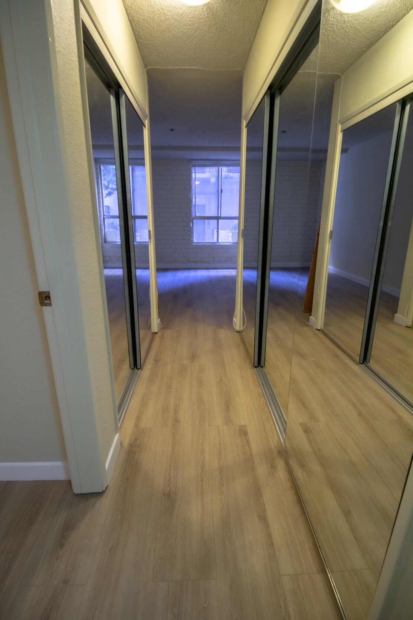 Hallway with Mirrored Closets - 1440 Veteran Ave