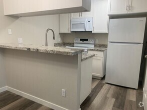 Building Photo - Downstairs 2 bedroom 2 bath brand new condo
