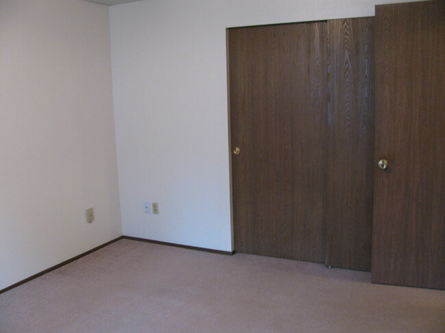 Bedroom 1 - looking at closet/entry from window - 12011 114th AVE CT E