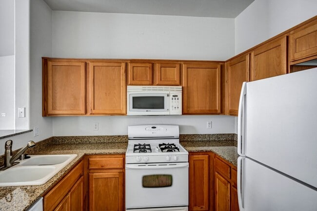 Building Photo - Second Story Condo with Open Floor Plan and Granite Counters