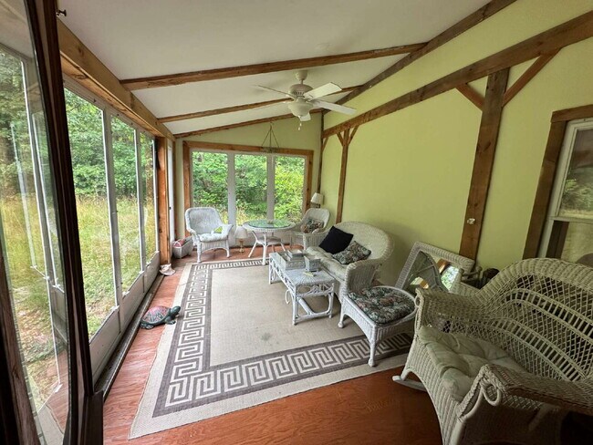 Building Photo - Charming 3BR Waterfront Retreat with Sunroom, Brick Accent & Scenic Lake Views