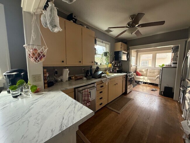 Building Photo - Stylish Hardwood Floors | Fenced Yard | 2-Car Garage | Prime Location