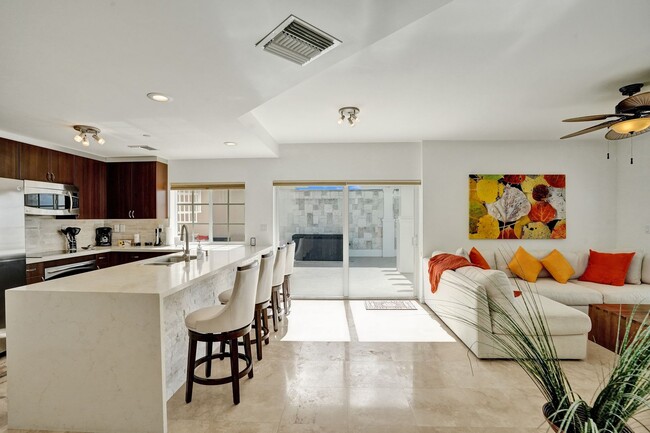 Building Photo - Gorgeous Penthouse Unit One Block from the...