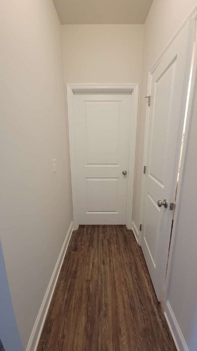 Building Photo - "Spacious 4-Bedroom Retreat with Modern Gr...