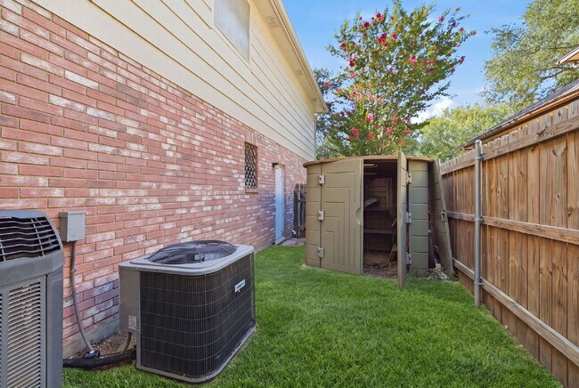 Building Photo - 4 Bedroom home with ZERO carpet close to RAFB