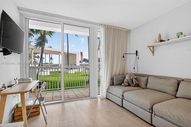 Building Photo - 10275 Collins Ave