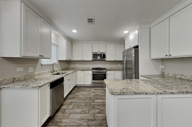 Building Photo - 2603 Hidden Garden Dr