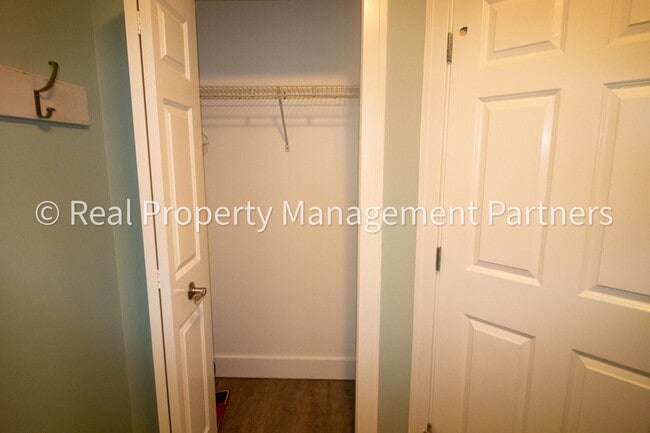 Building Photo - Spacious 3BR Townhome in Lowell | Nature Views & Maintenance-Free Living