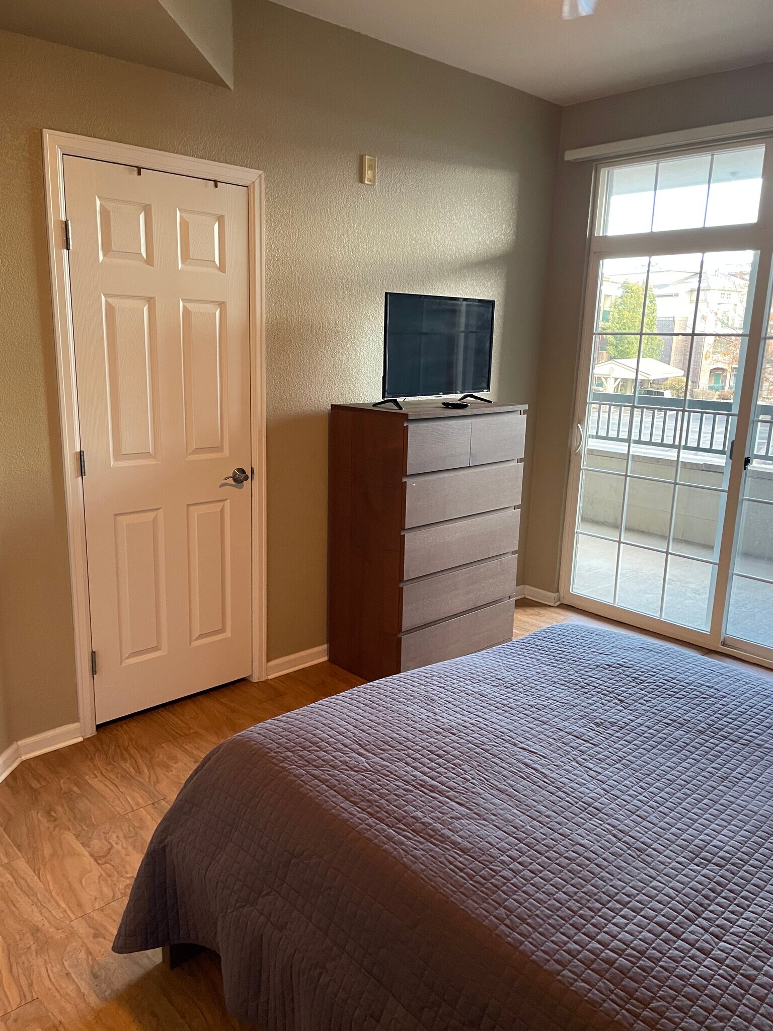 Main bed other direction. Balcony extends the length of the apartment and has outside storage - 3854 S Dayton Way