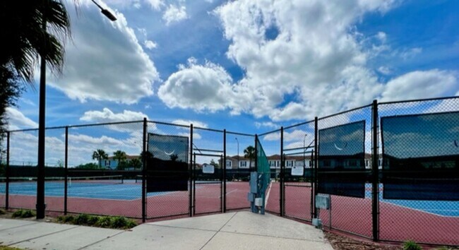 Building Photo - EAGLE CREEK LAKE NONA! WELCOME HOME! Beautiful water views! Spacious 2 story-3 bedroom 2.5 bath h...